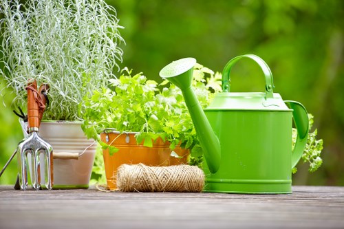 Landscape gardener maintaining a lush garden